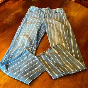 Boyish by her striped Brady jeans